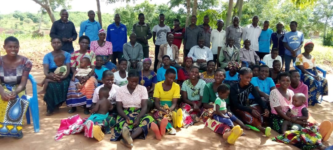Group photo with chiefs and members of KEYS and community after awareness campaign.